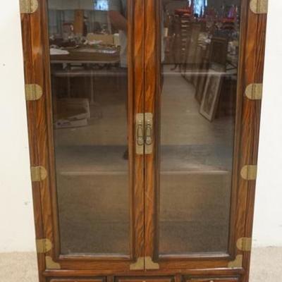 1014	ASIAN  DISPLAY CABINET WITH 2 GLASS DOORS, 3 DRAWERS, AND BRASS TRIM. 29 3/4 IN WIDE, 41 1/2 IIN HIGH, 14 IN DEEP
