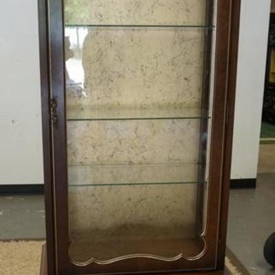 1046	LIGHTED DISPLAY CABINET WITH GLASS SHELVES. 2 DOORS BENEATH. 27 1/2 IN WIDE, 75 IN HIGH. SHELVES ADJUSTABLE
