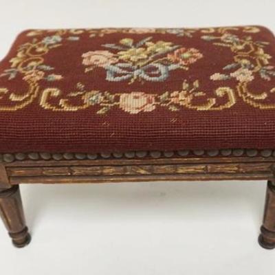1006	SMALL CARVED STOOL WITH NEEDLEPOINT TOP. 13 1/2 IN X 9 IN, 7 3/4 IN HIGH
