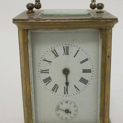 1001	BRASS CARRIAGE CLOCK WITH BEVELLED GLASS PANELS AND KEY.. 4 1/2 IN HIGH
