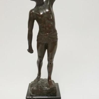 1002	BRONZE STATUE OF A MAN HOLDING A WREATH SIGNED MIAN. ON A BLACK POLISHED STONE BASE. 15 3/8  IN HIGH
