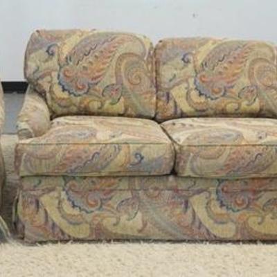 1043	2 PIECE UPHOLSTERED LIVING ROOM SUITE, SOFA AND ARM CHAIR WITH PAISLEY UPHOLSTERY. PURCHASED AT BLOOMINGDALES. SOFA APP 86 IN WIDE
