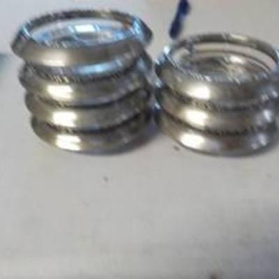 7 silver and glass coasters