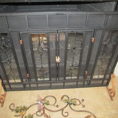 stunning fireplace screen with leaded glass panels and beveled glass.