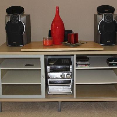System CX-NMA845 3CD Changer AM/FM Digital Audio.  Compact Stereo System w/Speakers.  Also showing a Fitzgerald & Floyd Flame Red Bottle...