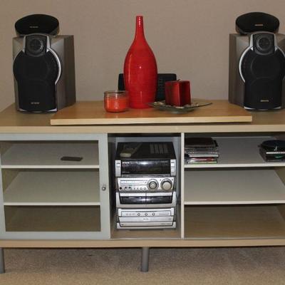 System CX-NMA845 3CD Changer AM/FM Digital Audio.  Compact Stereo System w/Speakers.  Also showing a Fitzgerald & Floyd Flame Red...