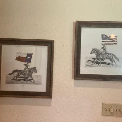 Cowboy art in rustic frames, hand-crafted on the estate