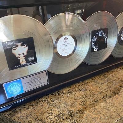 Tupac 5x platinum record award presented to Jive records