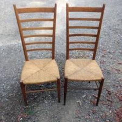 a pair of vintage ladder back chairs made in Italy