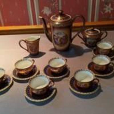 coffee set with 7 cups and saucer creamer and sugar bowl