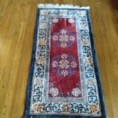 2 foot by 4 foot oriental rug