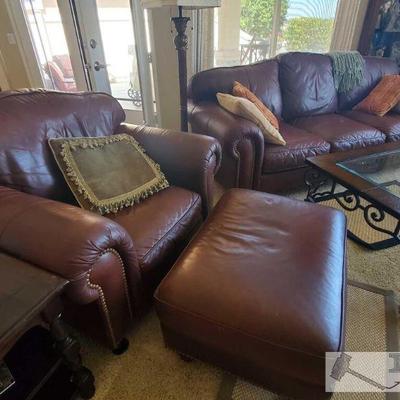 4412	
Leather Couch and Accent Chair with Ottoman
Couch measures approx 88
