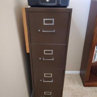 204	
Filing Cabinet and Sentry Safe with Keys
Cabinet Measures Approx 16