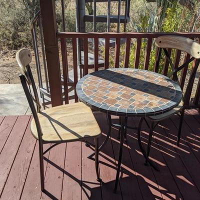 3 piece cafe stone top set, chairs have wooden seats. Good condition, $130