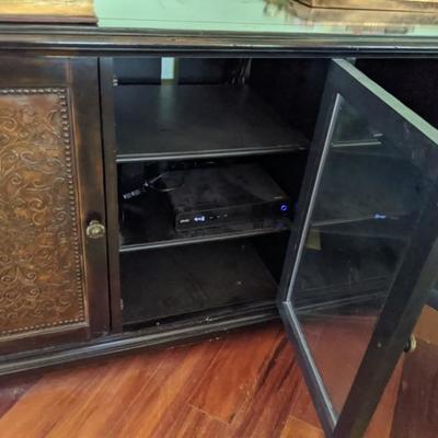 Leather face cabinet with dark wood 
60
