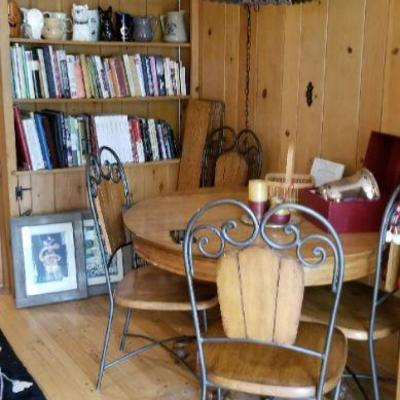 Round, claw foot, oak table, 4 wood & iron chairs + more