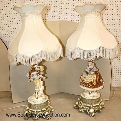 Lot: 724 - PAIR of VINTAGE bisque Italian table lamps with

PAIR of VINTAGE bisque Italian table lamps with fringed shades
