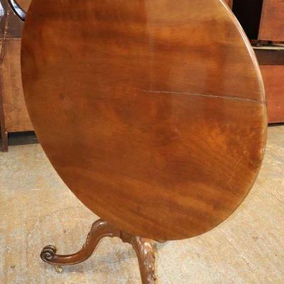 Lot: 631 - ANTIQUE SOLID mahogany tilt top breakfast table

ANTIQUE SOLID mahogany tilt top breakfast table with French carved legs
