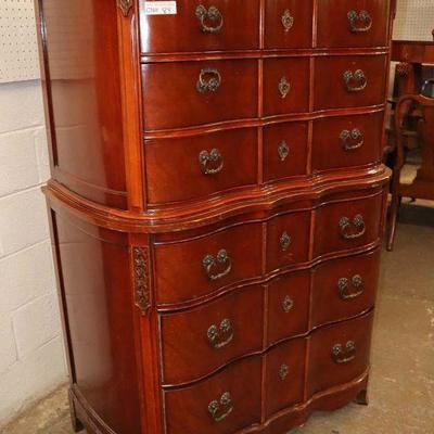 Lot: 703 - VINTAGE burl mahogany serpentine front 6 drawer

VINTAGE burl mahogany serpentine front 6 drawer high chest in the original...