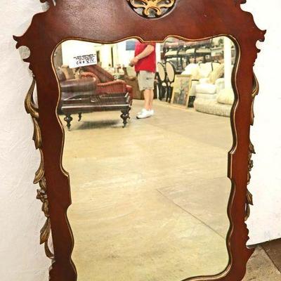 Lot: 659 - VINTAGE burl mahogany Chippendale style mirror

VINTAGE burl mahogany Chippendale style mirror
