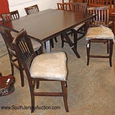 Lot: 706 - 7 piece modern design pub table with 6 chairs in

7 piece modern design pub table with 6 chairs in the espresso finish
