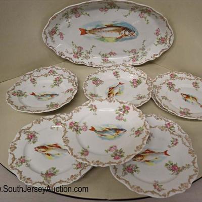 Lot: 531 - 19th Century 12 piece Royal Austria fish plate set

19th Century 12 piece Royal Austria fish plate set - platter with 11 plates
