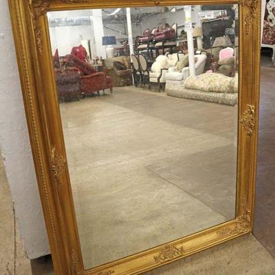 Lot: 661 - Decorator beveled carved gold color framed mirror

Decorator beveled carved gold color framed mirror
