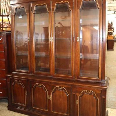 Lot: 627 - SOLID cherry 2 piece Traditional china cabinet

SOLID cherry 2 piece Traditional china cabinet with beveled glass and 9...