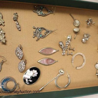 Lot: 504 - Lot of 6 pairs of earrings, 3 sets of cuff links,

Lot of 6 pairs of earrings, 3 sets of cuff links, watch band, 4 pins, and 2...
