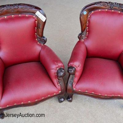 Lot: 485 - Child or doll size pair of reproduction Victorian

Child or doll size pair of reproduction Victorian solid mahogany chairs
