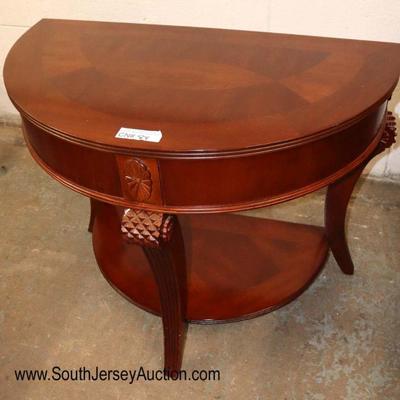 Lot: 687 - Like new mahogany carved Demilune lamp table

Like new mahogany carved Demilune lamp table
