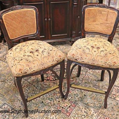 Lot: 424 - Pair of Country French style cane back pub chairs

Pair of Country French style cane back pub chairs
