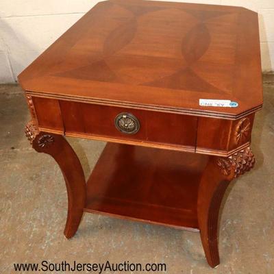 Lot: 688 - Like new mahogany carved rectangular lamp table

Like new mahogany carved rectangular lamp table with 1 drawer
