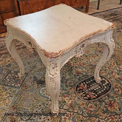 Lot: 416 - Distressed French style paint decorated lamp table

Distressed French style paint decorated lamp table in the manner of...