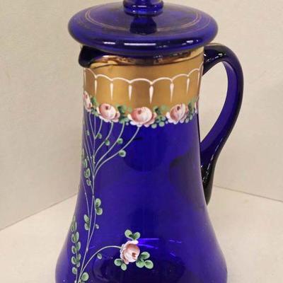 Lot: 523 - Mosser style hand painted cobalt blue pitcher with

Mosser style hand painted cobalt blue pitcher with lid
