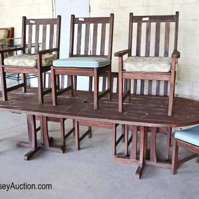 Lot: 470 - 9 piece Vintage teak outdoor patio table and 8

9 piece Vintage teak outdoor patio table and 8 chairs by Wood Classics
