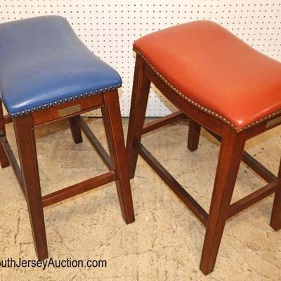 Lot: 620 - PAIR of mahogany frame leather tacked stools by

PAIR of mahogany frame leather tacked stools by Improvements
