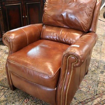 Lot: 426 - QUALITY leather tack arms and sides recliner by

QUALITY leather tack arms and sides recliner by Hancock and Moore - has some...
