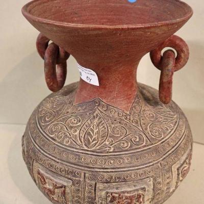 Lot: 556 - Pier One terracotta style decorative vase in the

Pier One terracotta style decorative vase in the manner of Aztec decoration

