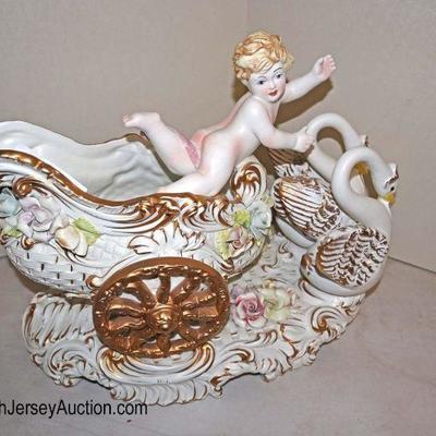 Lot: 719 - Bisque Italian table center piece made by Galdi of

Bisque Italian table center piece made by Galdi of cherubs, swans and...