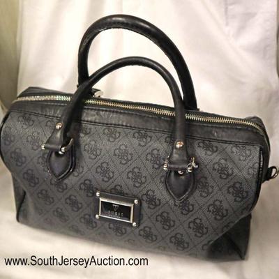 Lot: 495 - Black hand bag/purse by Guess - some wear

Black hand bag/purse by Guess - some wear
