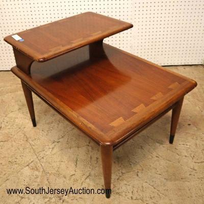 Lot: 609 - Mid Century modern Danish step table style #900-07

Mid Century modern Danish step table style #900-07 serial #365250 by Lane...