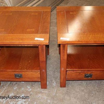 Lot: 699 - PAIR of Mission oak style 1 drawer lamp tables

PAIR of Mission oak style 1 drawer lamp tables with bow tie inlaid tops by...