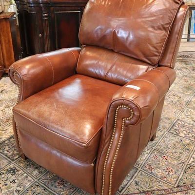 Lot: 425 - QUALITY leather tack arms and sides recliner by

QUALITY leather tack arms and sides recliner by Hancock and Moore - has some...