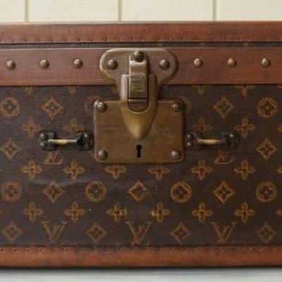 1099	VINTAGE LOUIS VUITTON SUITCASE, HANDLE MISSING, HAS STAINING ON THE INSIDE, 20 1/4 IN SQUARE X 9 1/2 IN

