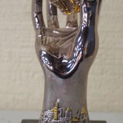 1093	HAND SCULPTURE W/DECORATED BALL, 6 1/2 IN HIGH

