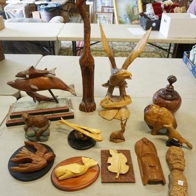 1073	LARGE LOT OF WOOD CARVINGS INCLUDING AN EAGLE, WADING BIRD IS 27 IN HIGH, 14 PC
