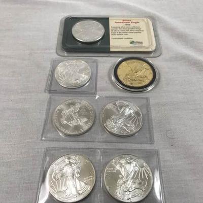 Seven 1oz Silver American Eagle Coins