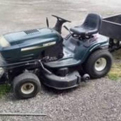 Craftsman Riding Lawnmower with Snow Plow, Trailer, and Tire Chains