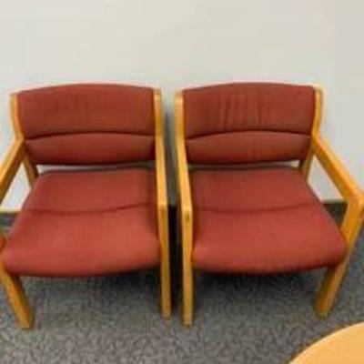Set of rust colored office chairs